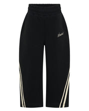 ŚSAINT Kids Barrel Trackpant in black with butter double stripe detail