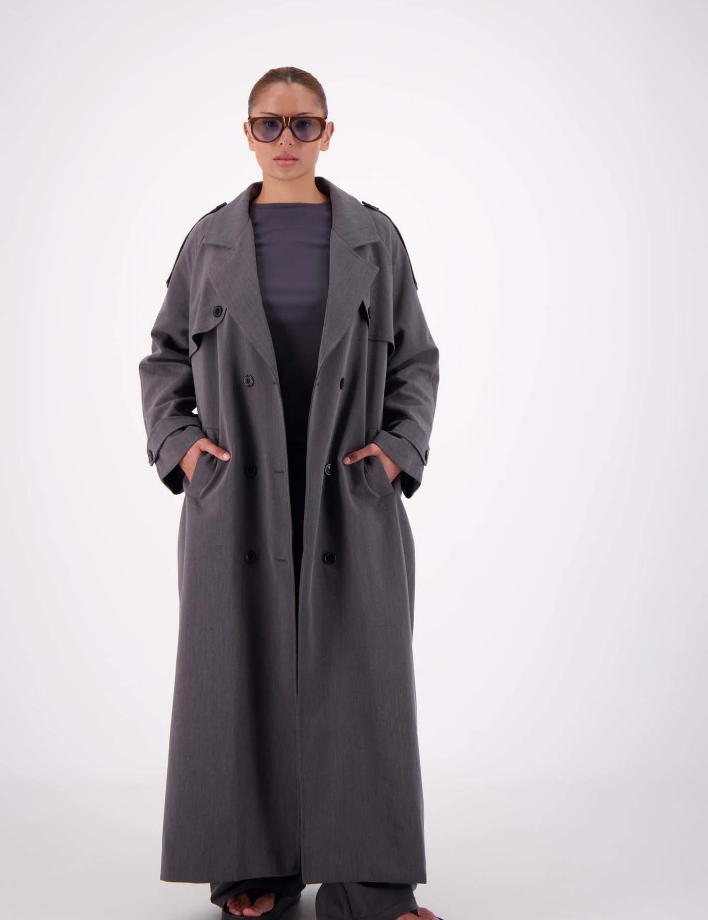 Serena Trench detail — shoulder epaulettes and button closure steel grey