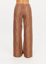 The Upside Javan Juliet Pant in leopard print, low rise with split hem detail back view