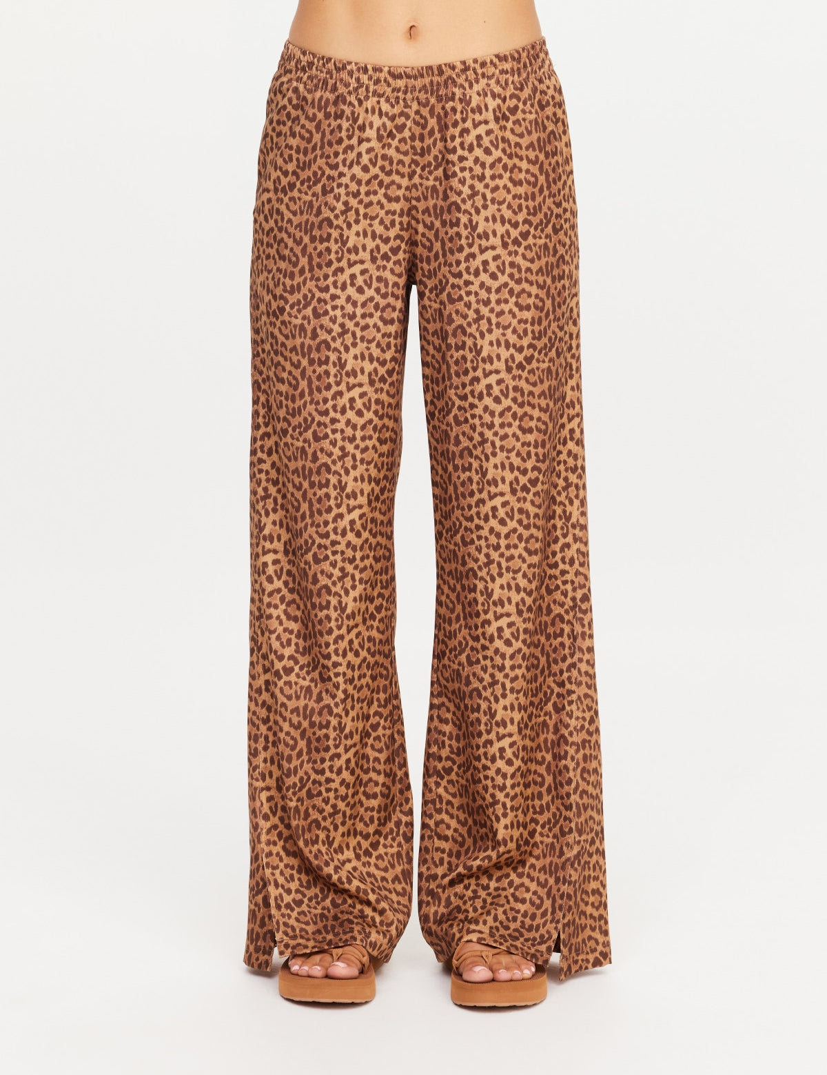 The Upside Javan Juliet Pant in leopard print, low rise with split hem detail front view