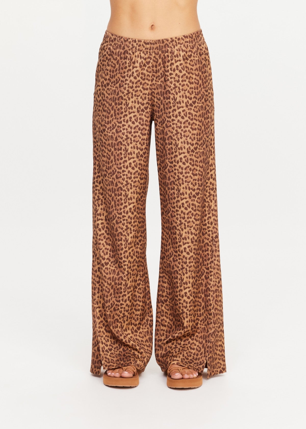 The Upside Javan Juliet Pant in leopard print, low rise with split hem detail front view