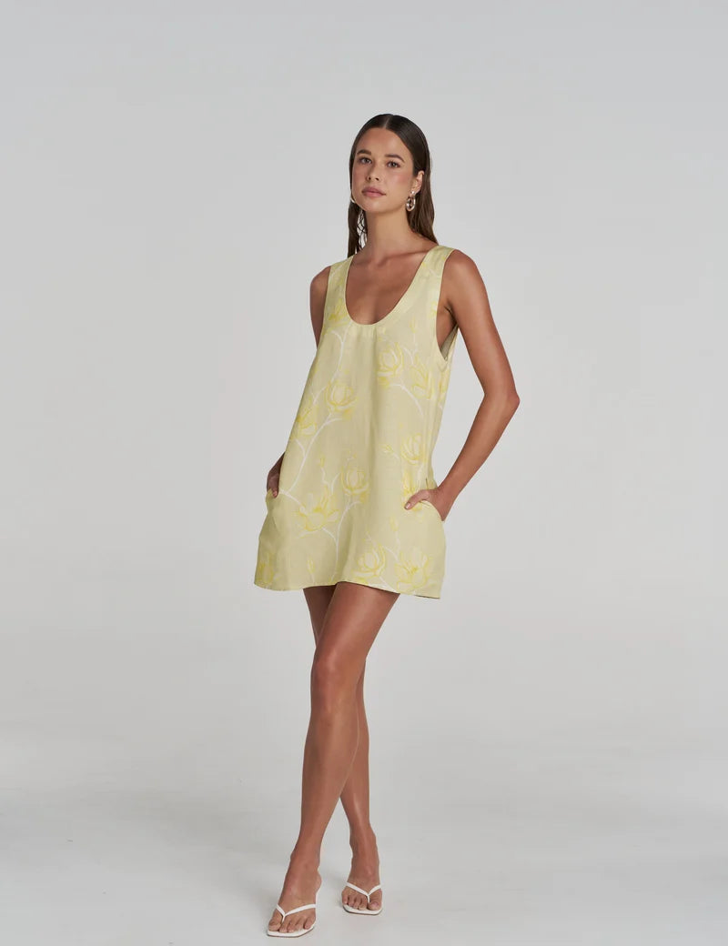 Flora Mini Dress in Magnolia model wearing with white heels
