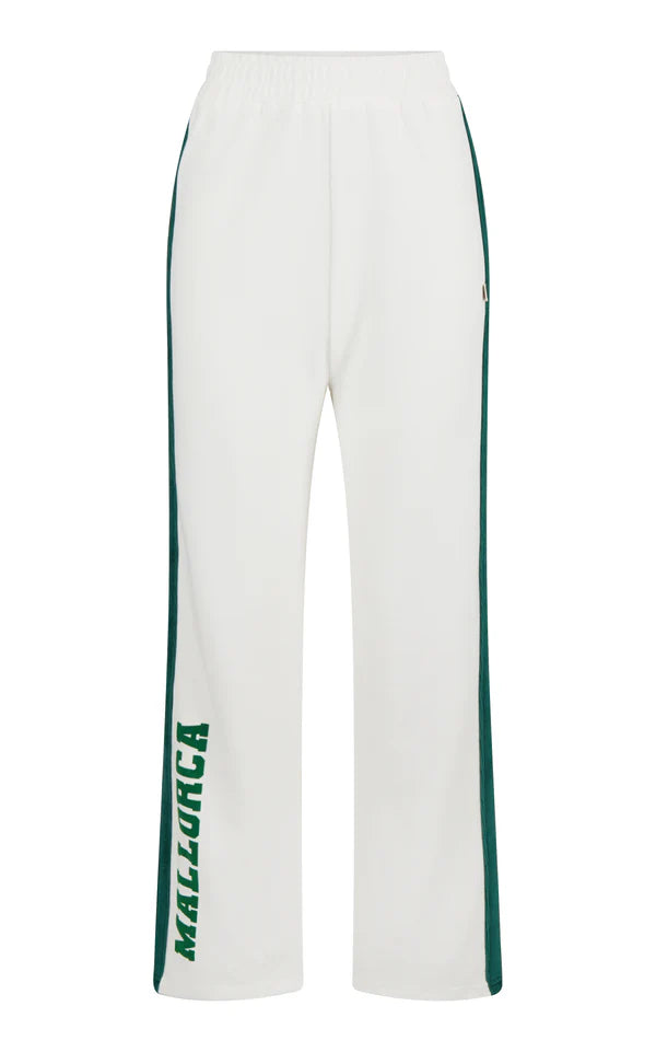 White pants with green accents and 'Malzurca' branding on a white background
