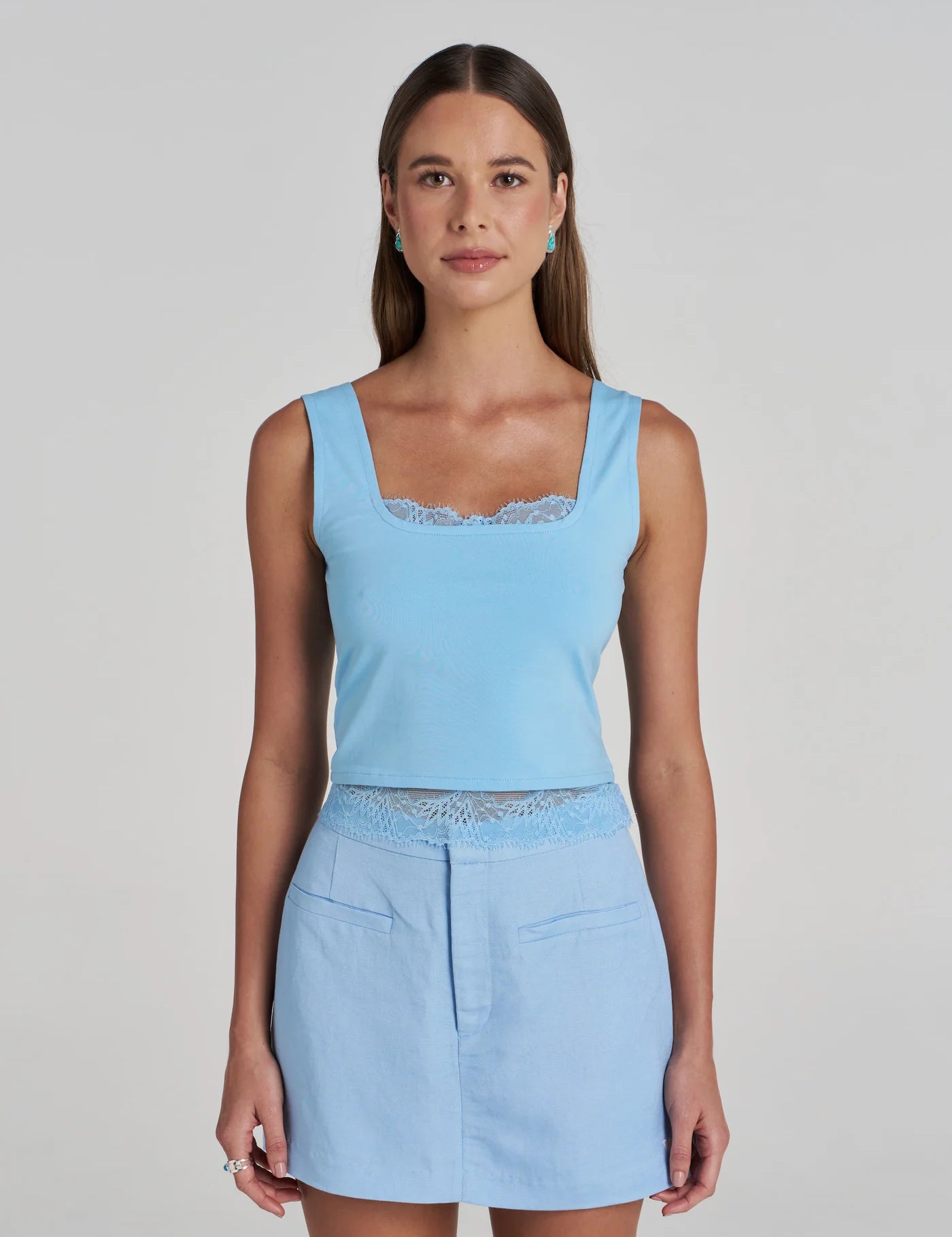 Model wearing the Summi Summi Ellidy Tank Top in Ocean with SUMMI SKORT IN OCEAN