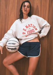 P.E Nation Backspin Sweat Grey Marle oversized cotton sweatshirt front view