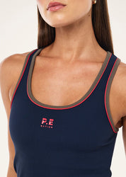 Close up of ribbed fabric and logo detail on P.E Nation Nexus tank
