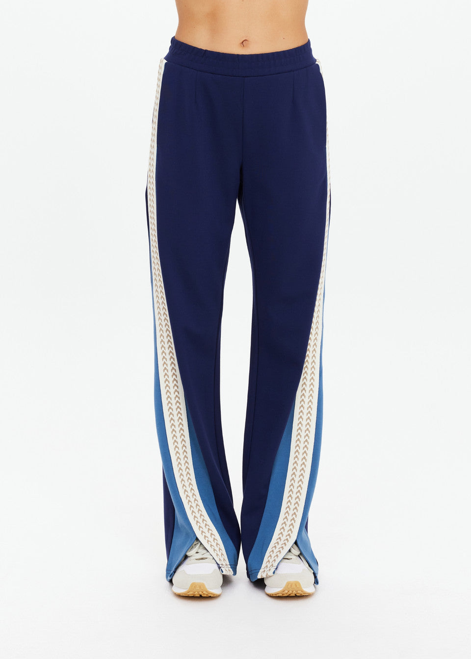 Chevron stripe detail The Upside Petra Flare Pant navy sport luxe pants