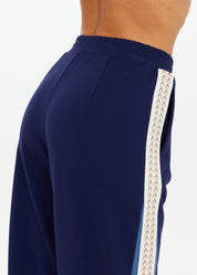 Back view The Upside Petra Flare Pant navy womens flared athleisure pants