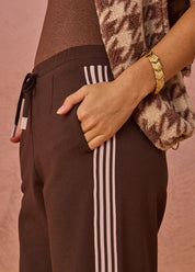 detail shot The Upside Petra flare pant in chocolate with pink stripe detail – Wild West Sisters