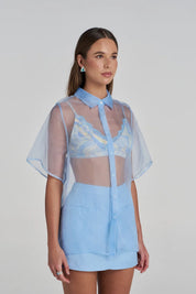 Model wearing the Summi Summi Romeo SS Shirt in Ocean buttoned up 