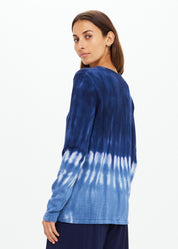 Model wearing The Upside Seeker Amana tie dye organic cotton knit sweater side