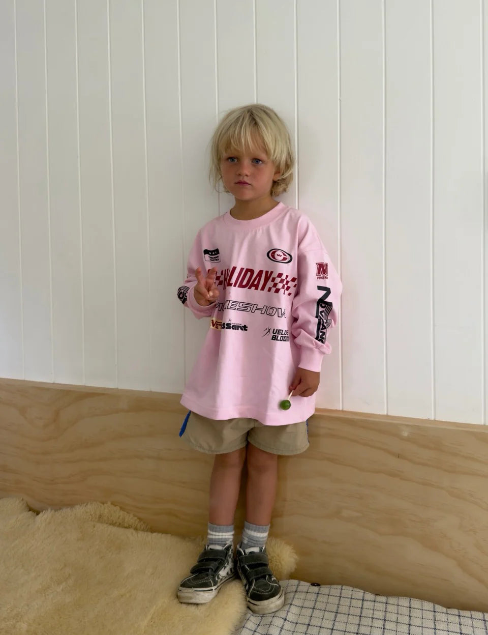 Child wearing Kids Moto Tee in pink, size 5-7, oversized relaxed fit, Wild West Sisters