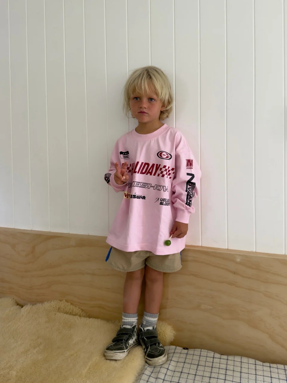 Child wearing Kids Moto Tee in pink, size 5-7, oversized relaxed fit, Wild West Sisters