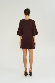 Back view of Summi Summi Knit Tie Front Dress in Chocolat with adjustable tie detail at back