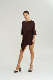 Side view of Summi Summi Knit Tie Front Dress in Chocolat showing wrap overlay and flattering mini silhouette.”